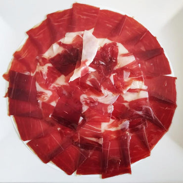 Carnísima Jamón ibérico eco Jamón ecológico de cebo de campo ibérico (50% raza ibérica) al corte 100-120g carne
