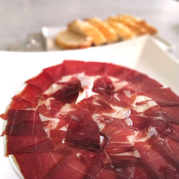 Carnísima Jamón ibérico eco Jamón ecológico de cebo de campo ibérico (50% raza ibérica) al corte 100-120g carne